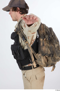 Reece Bates Contractor A pose 1 army vest backpack upper…